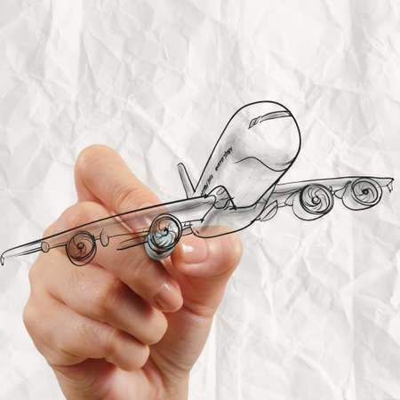 hand drawing airplane with crumpled paper background as conceptの写真素材