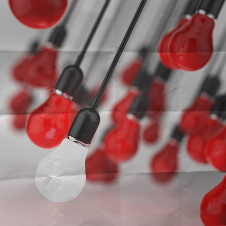 creative idea and leadership concept light bulb on crumpled paper backgroundの写真素材