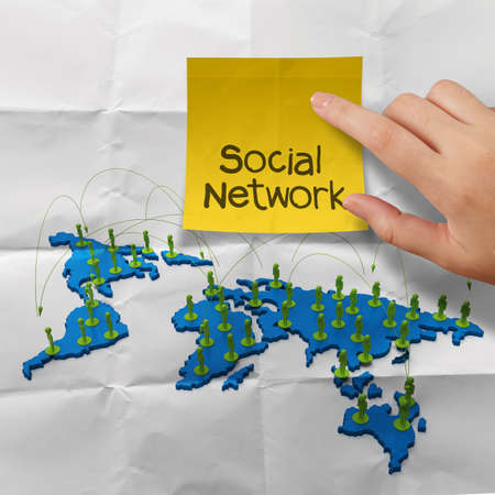hand holding sticky note social network 3d stainless human social network on crumpled paper as conceptの写真素材