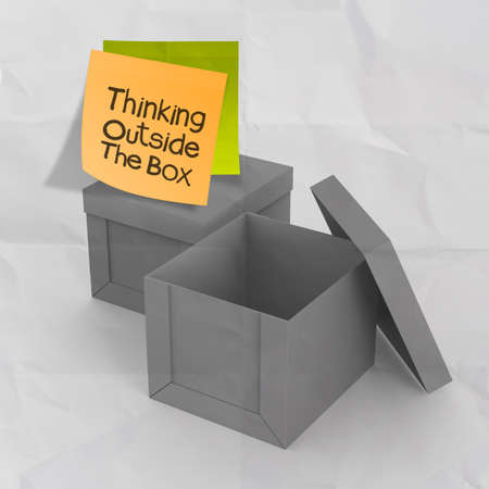 thinking outside the box on crumpled sticky note paper as conceptの写真素材