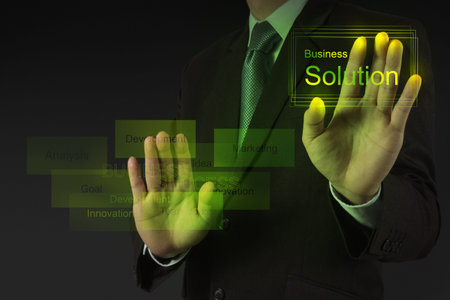 businessman hand working with new modern computer and business solution as concept