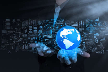 businessman hand show 3d the world and business strategy as conceptの写真素材