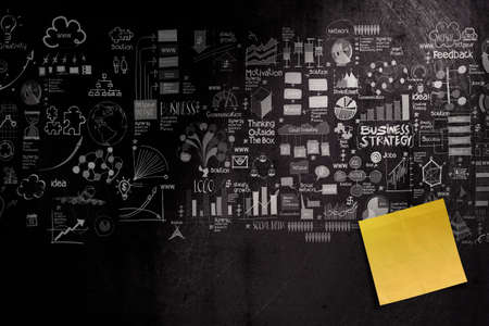blank sticky note on hand drawn business strategy background as conceptの写真素材