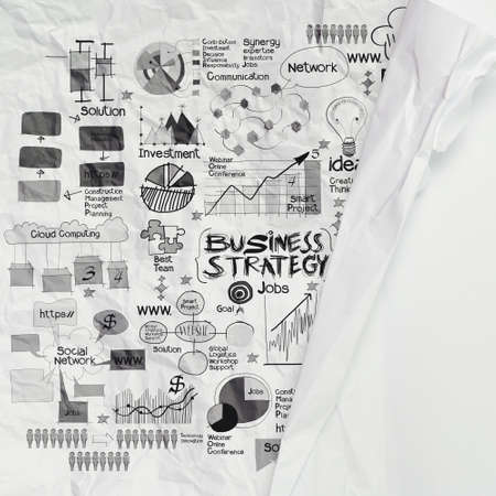 hand drawn business strategy on crumpled paper as conceptの写真素材
