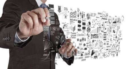businessman hand working with new modern computer and business strategy as conceptの写真素材