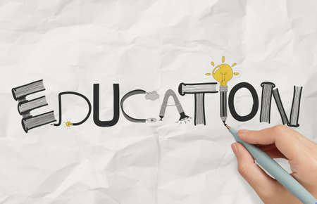 business hand drawing graphic design EDUCATION word on crumpled paper as conceptの写真素材