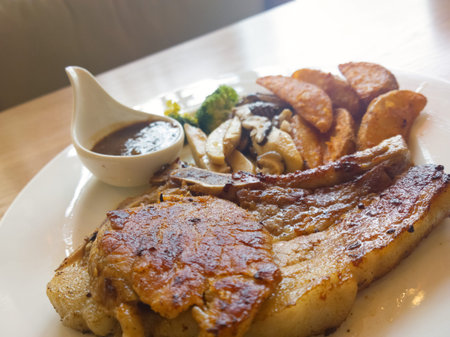 Pork steak with vegetables and french fried