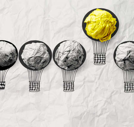 hand drawn air balloons with crumpled paper ball as leadership conceptの写真素材