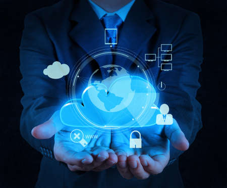 businessman hand cloud 3d icon on touch screen computer as Internet security online business concept の写真素材