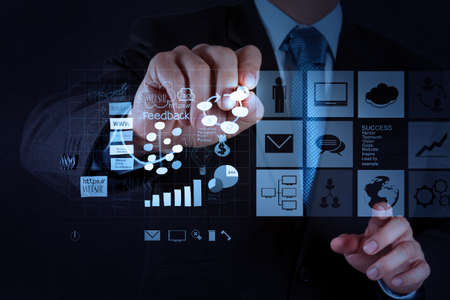 businessman hand working with new modern computer and business strategy as conceptの写真素材