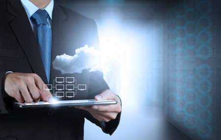 Businessman hand working with a Cloud Computing diagram on the new computer interface as conceptの写真素材