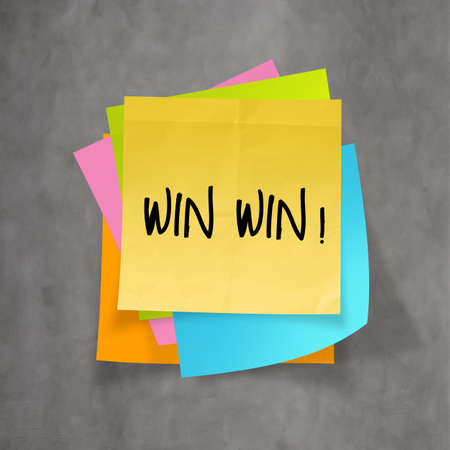 win win words on crumpled sticky note paper as conceptの写真素材