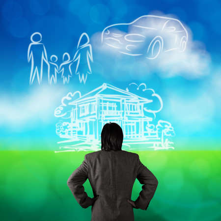 businessman looking at planning family future blue and green nature background as concept の写真素材