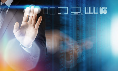 Businessman hand working with a Cloud Computing diagram on the new computer interface as concept