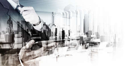 Double exposure of businessman and abstract city as conceptの写真素材