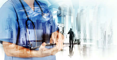 Double exposure of smart medical doctor working with abstract city as concept の写真素材