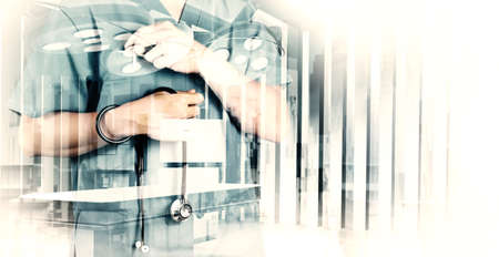Double exposure of smart medical doctor working with abstract city as concept の写真素材