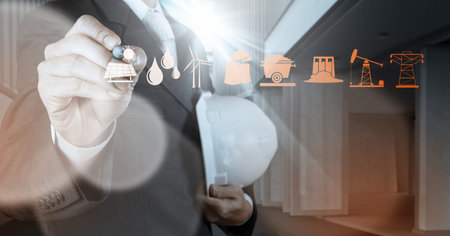 businessman hand working with new computer interface show building development conceptの写真素材