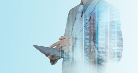 Double exposure of businessman shows modern technology as concept