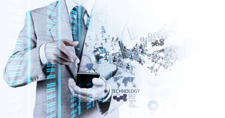 Double exposure of businessman shows modern technology as concept