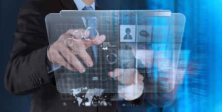 businessman hand working with new modern computer and business strategy as concept