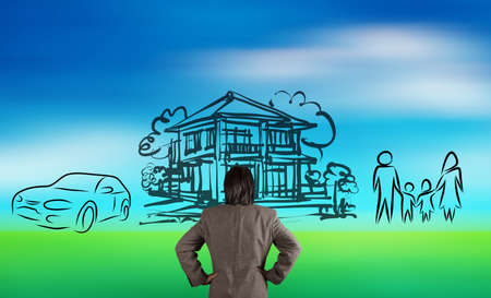 businessman looking at  planning family future on blur nature background as conceptの写真素材