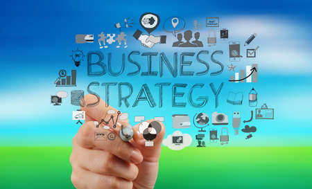 businessman hand working with new modern computer and business strategy as conceptの写真素材