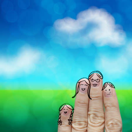 happy finger family on green nature backgroundの写真素材