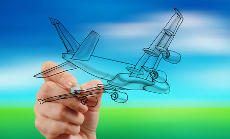 hand drawing airplane on blur blue sky backgroundの写真素材