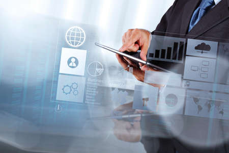 businessman hand working with new modern computer and business strategy as conceptの写真素材