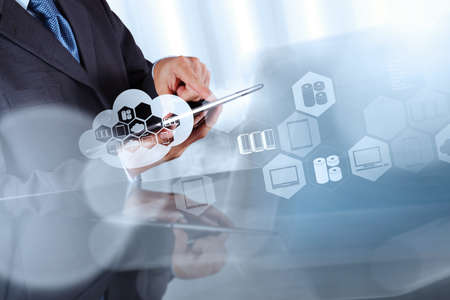Businessman hand working with a Cloud Computing diagram on the new computer interface as conceptの写真素材