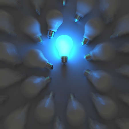 3d growing light bulb standing out from the unlit incandescent bulbs as leadership conceptの写真素材