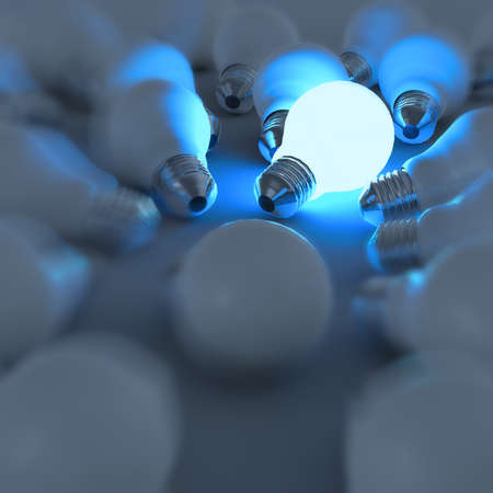 3d growing light bulb standing out from the unlit incandescent bulbs as leadership conceptの写真素材