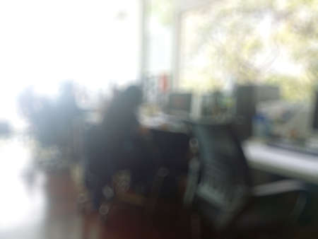 abstract office with computer blur backgroundの写真素材