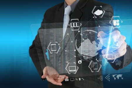 businessman shows modern technology as conceptの写真素材