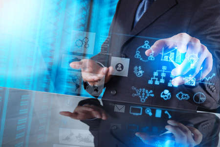 businessman hand working with new modern computer and business strategy as conceptの写真素材
