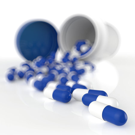 Pills 3d spilling out of pill bottle on whiteの写真素材