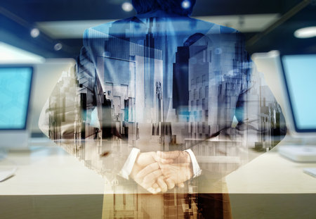 Double exposure of businessman and computer retail background as concept