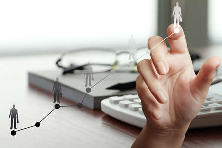 close up of hand working with new modern computer and business strategy leader as conceptの写真素材