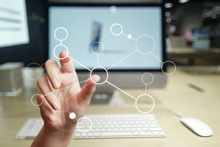 close up of hand drawing blank flow chart on new modern computer as conceptの写真素材