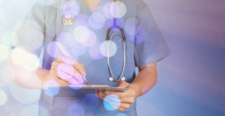 double exposure of success smart medical doctor working with abstract blurry bokeh  background as conceptの写真素材