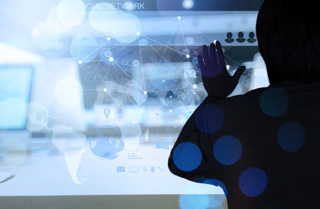 Double exposure of businessman working with new modern computer show social network structure and bokeh exposureの写真素材