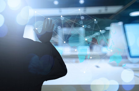 Double exposure of businessman working with new modern computer show social network structure and bokeh exposureの写真素材