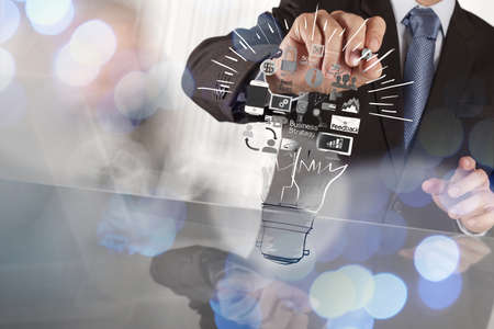 hand drawing creative business strategy with light bulb as conceptの写真素材