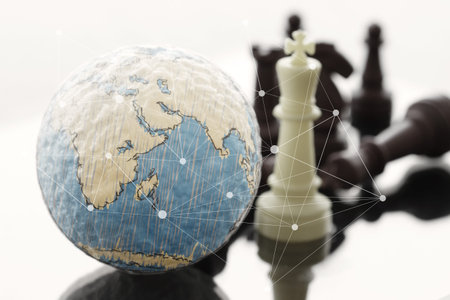chess with texture globe and network diagram as business compettion concept