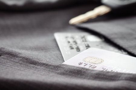 Credit cards in very shallow focus  with gray suit background as online shopping concept