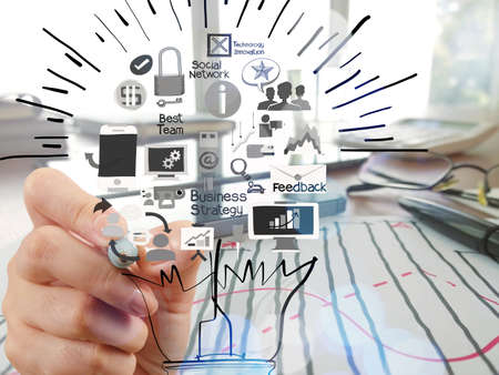 hand drawing creative business strategy with light bulb as conceptの写真素材