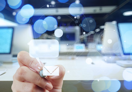 businessman hand use interactive computer with virtual email icon as concept