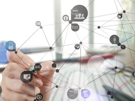 Double exposure of businessman hand working with new modern computer show social network structure...