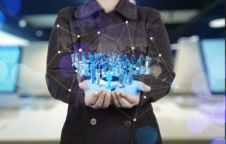 Double exposure of businesswoman working with new modern computer show social network structure and...